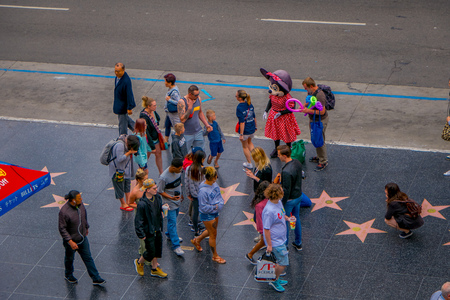 Los Angeles, California, USA, JUNE, 15, 2018: Above view of unidentified tourists in walk of fame in Los Angeles. Hollywood Walk of Fame features more than 2,500 stars with inscribed celebrity namesのeditorial素材