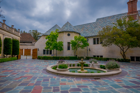 Los Angeles, California, USA, JUNE, 15, 2018: Outdoor view of Luxury House and estates with a nicely fountain in front yard in Beverly Hills City, LA, CAのeditorial素材