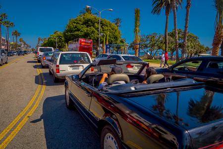 Los Angeles, California, USA, JUNE, 15, 2018: Outdoor view of unidentified people in a cars circulating over a the treets in Santa monica in a gorgeous sunny summer day with blue skyのeditorial素材
