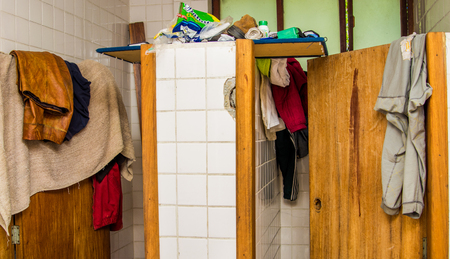 QUITO, ECUADOR, AUGUST 21, 2018: Indoor view of clothes in a bathroom inside of a refuge for Venezuelan people that escape from their country because of economical situationのeditorial素材