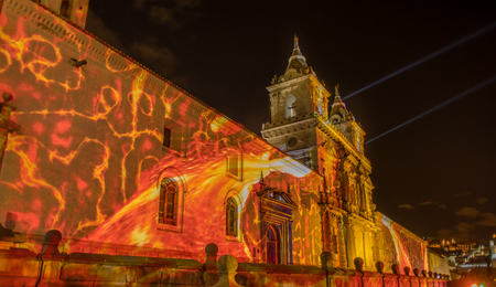 QUITO, ECUADOR- AUGUST, 15, 2018: The San Francisco church illuminated with laser technology in the festival of lights for the month of culture and the arts in every August in the city of Quitoのeditorial素材