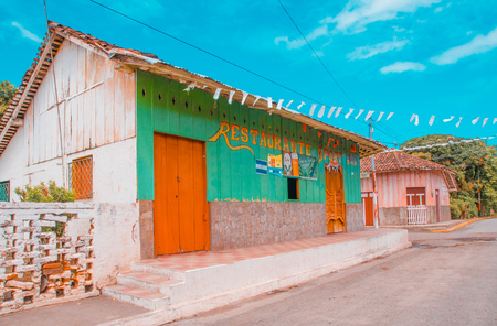OMETEPE, NICARAGUA, MAY, 14, 2018: Outdoor view of wooden colorful buildings located in the city of Ometepe Island in a gorgeous sunny dayのeditorial素材