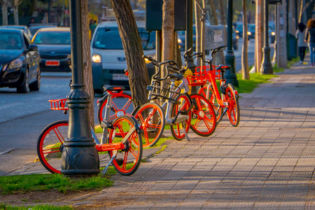 SANTIAGO, CHILE - SEPTEMBER 13, 2018: Outdoor view of bikes parked in a row in the center of the city in Santiago, Chileのeditorial素材