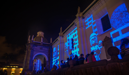 QUITO, ECUADOR- AUGUST, 15, 2018: Beautiful view of El Sagrario church illuminated with laser technology in the festival of lights every Augusts with colorful lights during the Quitoのeditorial素材