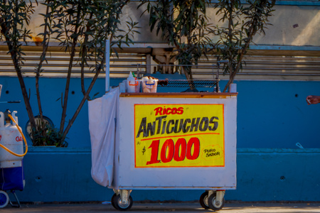 SANTIAGO, CHILE - SEPTEMBER 13, 2018: Outdoor view of metallic cart used to sell food in the street in the center of the city in barrio Yungay in Santiago, Chileのeditorial素材