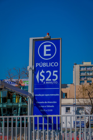 SANTIAGO, CHILE - SEPTEMBER 13, 2018: Outdoor view of informative sign of fee parking area per minut located in the Barrio Yungay in Santiago, capital of Chileのeditorial素材