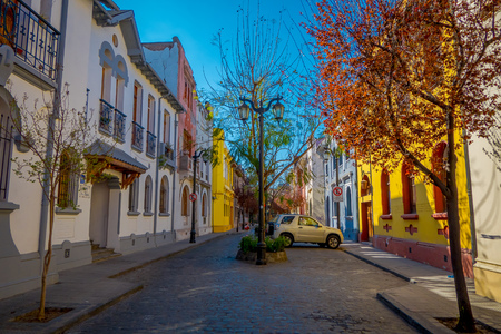 SANTIAGO, CHILE - SEPTEMBER 13, 2018: Cars parked under trees at one side of the street in the Barrio Yungay in Santiago, capital of Chileのeditorial素材