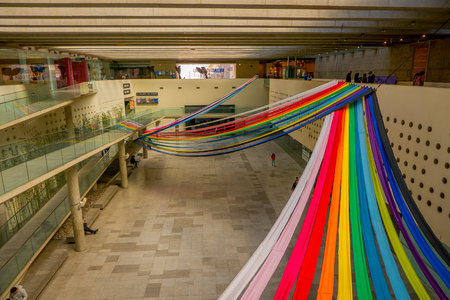 SANTIAGO, CHILE - SEPTEMBER 13, 2018: Costanera Center mall interior, with some rainbow structures hanging in top of the mall in Santiago of Chileのeditorial素材