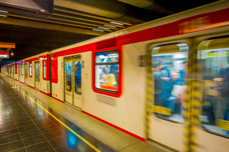 SANTIAGO, CHILE - SEPTEMBER 14, 2018: Indoor view of blurred metro in the rails inside of the Estacion Alameda, central station. Opened in 1885, now it is the citys only railway stationのeditorial素材
