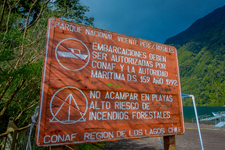 PUERTO VARAS, CHILE, SEPTEMBER, 23, 2018: Informative sign of National Park Vicente Perez Rosales in front of the Lake Todos Los Santos, Region in Chileのeditorial素材
