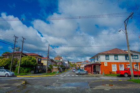 PUERTO VARAS, CHILE, SEPTEMBER, 23, 2018: Outdoor view of cars parked in front of house buildings in the streets of Puerto Varas during gorgeous sunny dayのeditorial素材