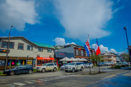 PUERTO VARAS, CHILE, SEPTEMBER, 23, 2018: Cars parked in front of house buildings in the streets of town at Puerto Varas during gorgeous sunny dayのeditorial素材