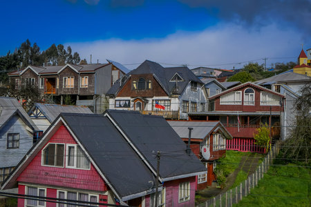 Above view of rooftop of colorful houses in the horizont located in Castro, Chiloe Island
