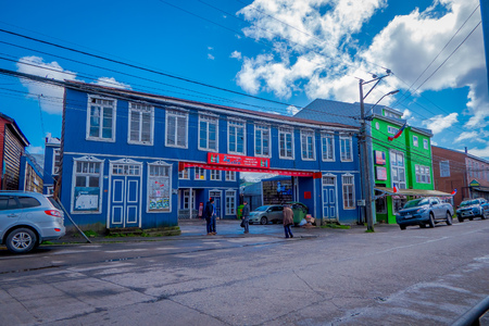 CHILOE, CHILE - SEPTEMBER, 27, 2018: Outdoor view of blue wooden building in Chiloe island in a gorgeous blue sky in Chileのeditorial素材