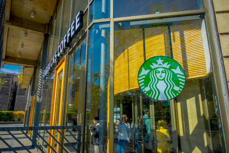 SANTIAGO, CHILE - OCTOBER 16, 2018: Outdoor view of Starbucks Coffee Outlet in Santiago of Chile. Starbucks is an American global coffee company and is the largest coffeehouse company in the worldのeditorial素材