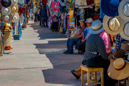 OTAVALO, ECUADOR, NOVEMBER 06, 2018: Outdoor view of street market with typical clothes of Otavalo in Otavaloのeditorial素材