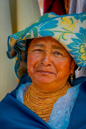 OTAVALO, ECUADOR, NOVEMBER 06, 2018: Portrait of an unidentified hispanic indigenous woman wearing andean traditional clothing and headscarf, posing for cameraのeditorial素材