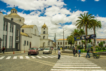 Latacunga, Ecuador September, 28, 2018: Unidentified people walking in front of la merced church in latacunga, Ecuadorのeditorial素材