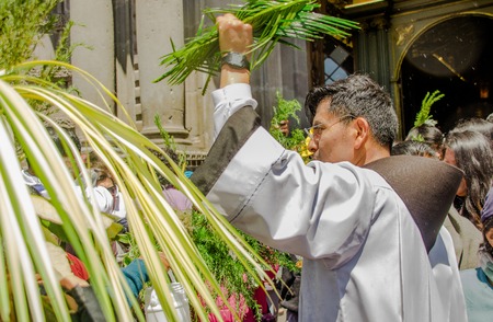 QUITO, ECUADOR- MARCH 23, 2018: Outdoor view of unidentified people participating in the celebration of Palm Sunday before Easterのeditorial素材