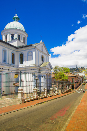 QUITO, ECUADOR SEPTEMBER, 28, 2018: Outdoor view of of colonial street with gorgeous buildings in the city of Quito Ecuadorのeditorial素材