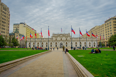 SANTIAGO, CHILE - SEPTEMBER 14, 2018: Outdoor view of of people walking in front of Palacio de la Moneda in Santiago de Chileのeditorial素材