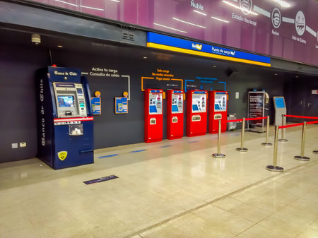 SANTIAGO, CHILE - OCTOBER 09, 2018: Indoor view of atm bank machine and charger machines inside of...