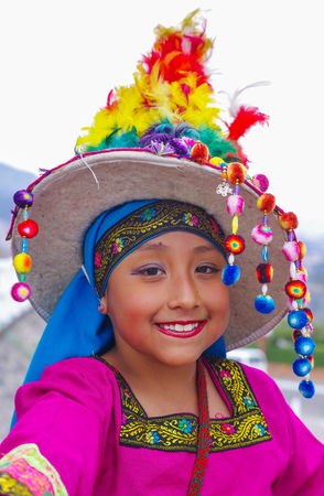 Quito, Ecuador, December, 12 2018: Outdoor view of beautiful girl wearing typical folklore clothes used for performances dancing on the street of old town Quitoのeditorial素材