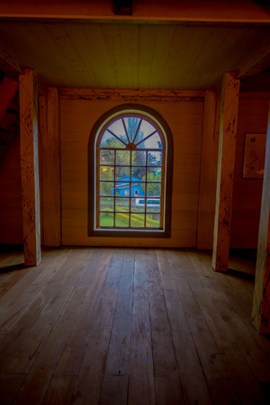 CHILOE, CHILE - SEPTEMBER, 27, 2018: Indoor view of historic church of Nercon, with a gorgeous mitral windows in catholic temple located in the chilota commune southern Chile, World Heritage by Unescoのeditorial素材