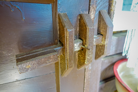 CHILOE, CHILE - SEPTEMBER, 27, 2018: Close up of selective focus of wooden structure located in the a wooden doos inside of Chonchi museum, donated by families of Chonchi, opened in 1996のeditorial素材