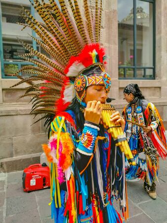 Quito, Ecuador, September 29, 2019: Music indigenous street performers in the historic centre of Quito, Ecuador.のeditorial素材