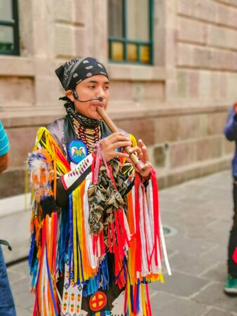 Quito, Ecuador, September 29, 2019: Music indigenous street performers in the historic centre of Quito, Ecuador.のeditorial素材