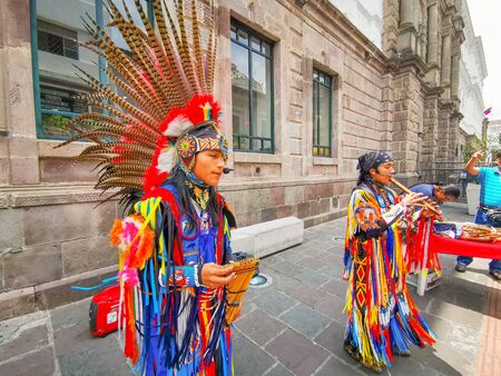 Quito, Ecuador, September 29, 2019: Music indigenous street performers in the historic centre of Quito, Ecuador.のeditorial素材