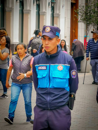 Quito, Ecuador, September 29, 2019: Police guarding the historic centre of Quito.のeditorial素材