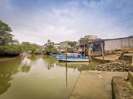 Sua, Ecuador, October 03, 2019: Fishing Boats in the river of the town of Sua beach in Ecuador.のeditorial素材