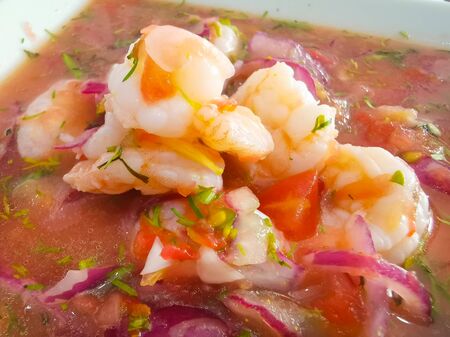 Ecuador food: shrimp ceviche, raw fish. with popcorn and plaintainの写真素材
