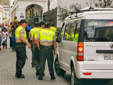 Quito, Ecuador, September 29, 2019: Police guarding the historic centre of Quito.のeditorial素材