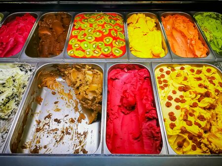 Organic ice cream in frozen metallic trays on metallic surface. Top viewの写真素材