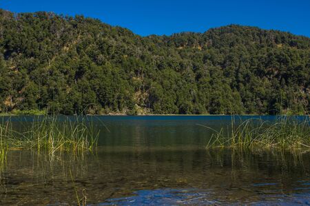 Lago Espejo Grande near Villa la Angostura in Neuquen Province, Argentina. Beautiful sunset on Lago Espejo Grandeの写真素材