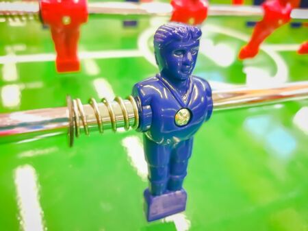 Foosball. Table with red and blue players detail perspective.の写真素材