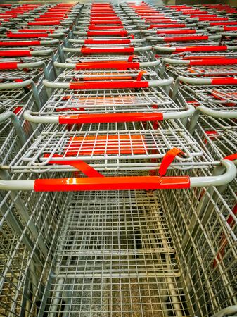 Supermarket Carts. Several rows of supermarket carts. high angle.の写真素材