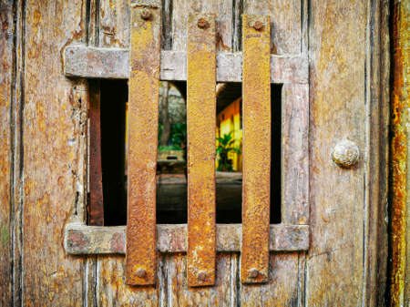 CARTAGENA, COLOMBIA - NOVEMBER 09, 2019: Colorful buildings and details of architecture in a street of the old city of Cartagenaのeditorial素材