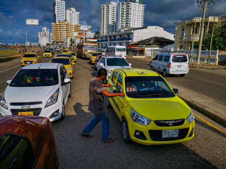 CARTAGENA, COLOMBIA - NOVEMBER 09, 2019: Colorful buildings in a street of the old city of Cartagena Cartagena de Indias in Colombiaのeditorial素材
