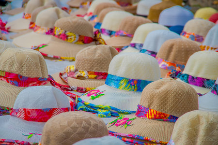 Assortment of genuine hand-made hat on a shelf.
