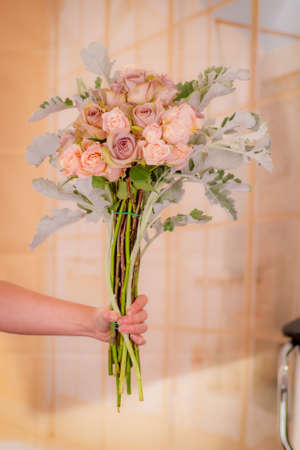 A bouquet of Pink roses and green foliage variety, studio shot, pink flowers High quality photoの写真素材