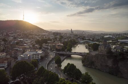 Aerial Cityscape of Tbilisi, Georgia, sunset and cityscape of Tbilisi, Georgia, view on the mountains on backroundの写真素材