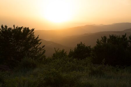 Beautiful landscape in the mountains with the sun at dawn. Mountains at the sunset time. Azerbaijan Caucasus Mountains. Agsu pass. Baskal. Nature.の写真素材