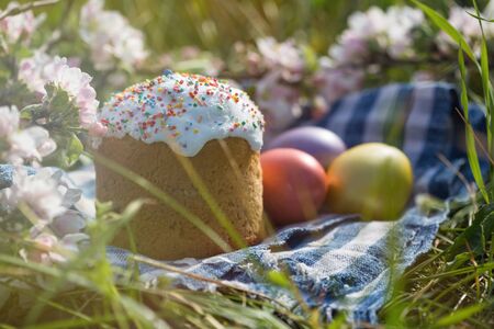 Photo of Easter cake and eggs. Traditional Russian and Ukrainian Easter cake kulich and painted eggs.の写真素材