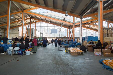Tbilisi, Georgia - Mart 21 2019: The Dezerter Bazaar or Dezertirka- biggest food market in Tbilisi near station square. Local food market selling vegetables, fruits, meat, fish, nuts, dairy products, flea market, goodsのeditorial素材