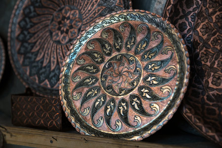 Copper plate handcrafted, traditionally made in Lagich, Azerbaijan. Handmade plate in souvenir shop