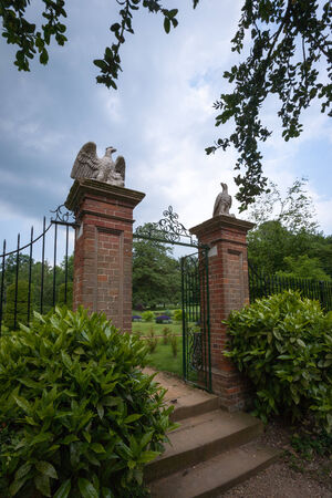 An ornate gated entrance to a public park in Cambridgeshire, UK.のeditorial素材